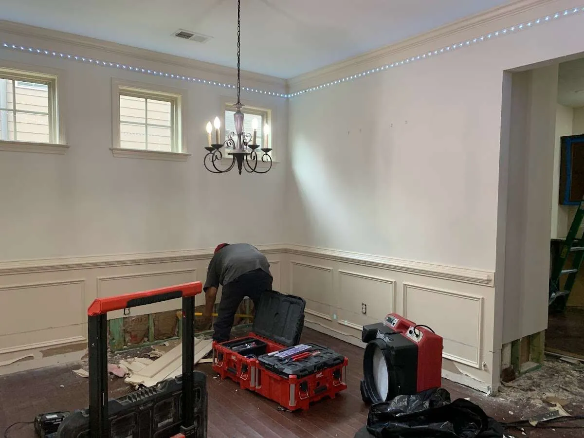 Restoration technician with professional equipment in South Orange Village
